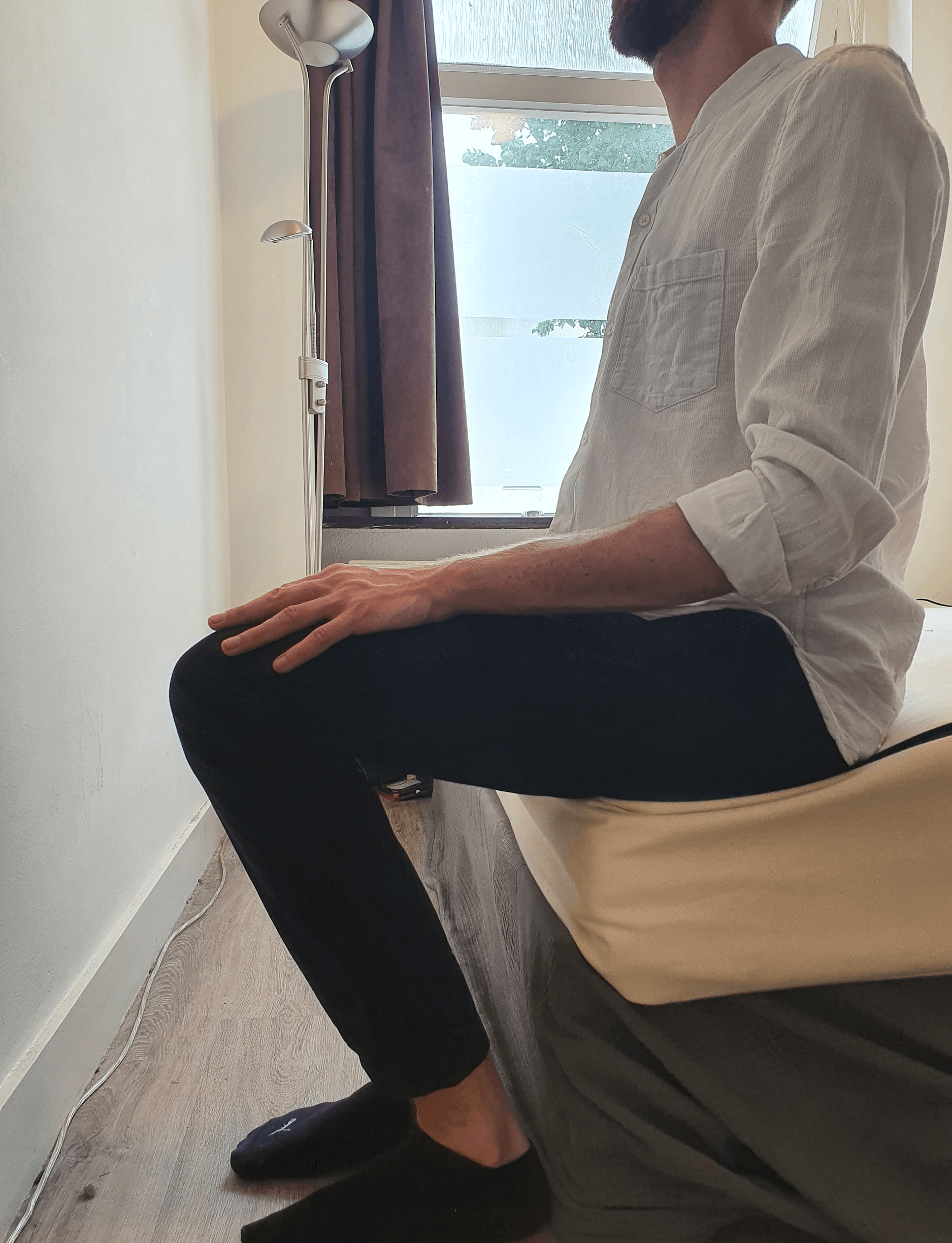 Zittend op het Una matras